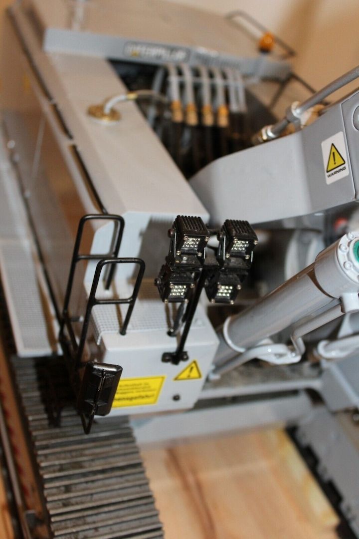 Caterpillar Bagger 385 1:16 / 1:14