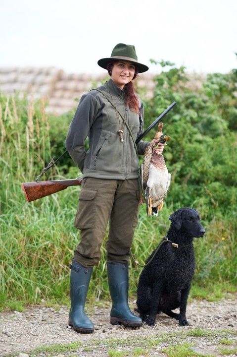 Welpen Curly Coated Retriever lockig