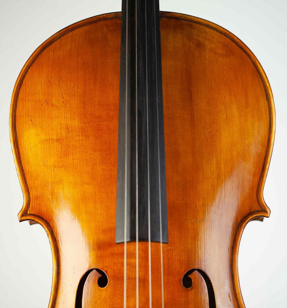 Old cello labeled G. Pedrazzini 1945 violoncello