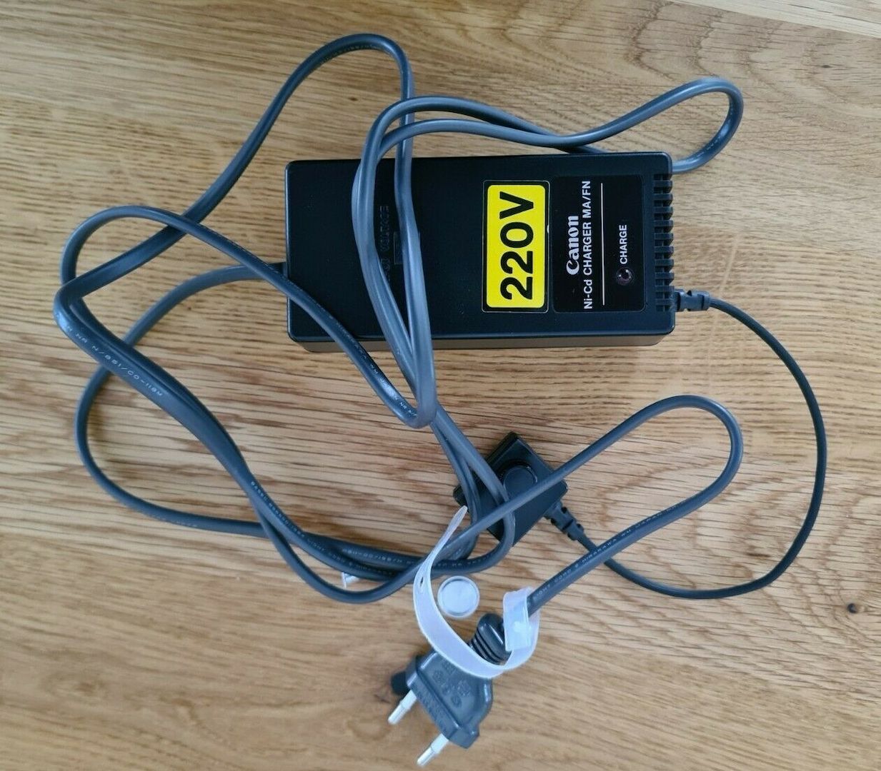 Canon NEW F-1 mit 50 mm 11.4 FD Objektiv, AE Motor Drive und Blitzgerät 155A