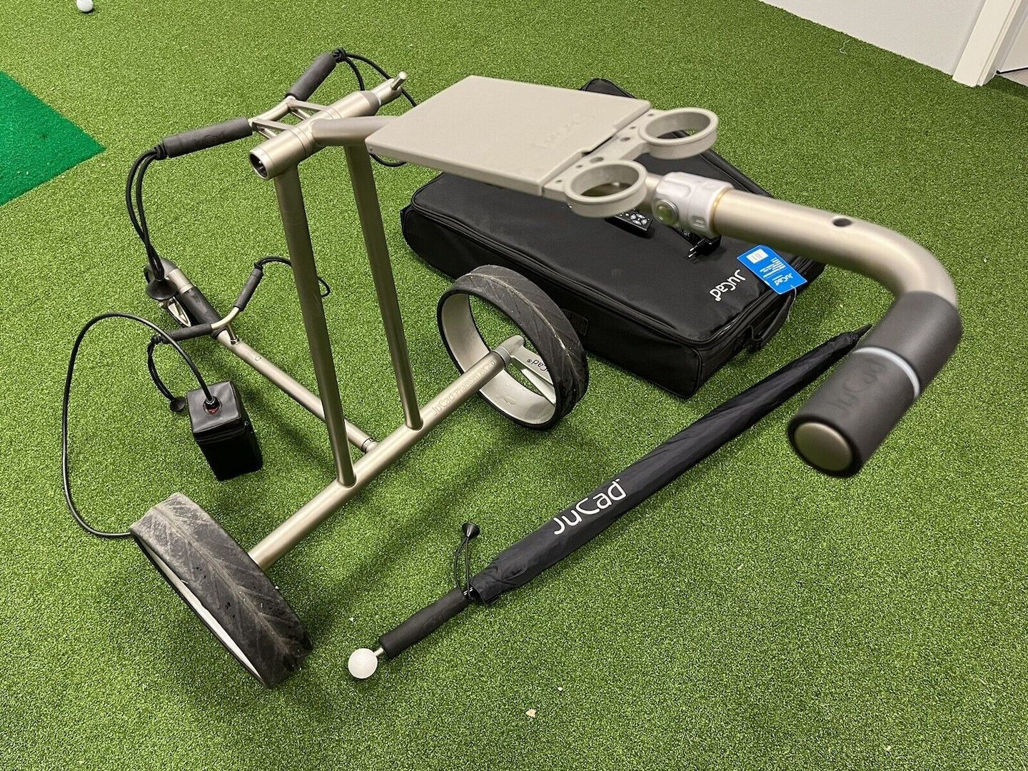 JuCad Phantom Titan eX 2.0 Elektrocaddy, Fernbedienung, JuCad Regenschirm