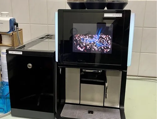 WMF 1500S Kaffeevollautomat mit Milchkühler, überholt + Pflegeset