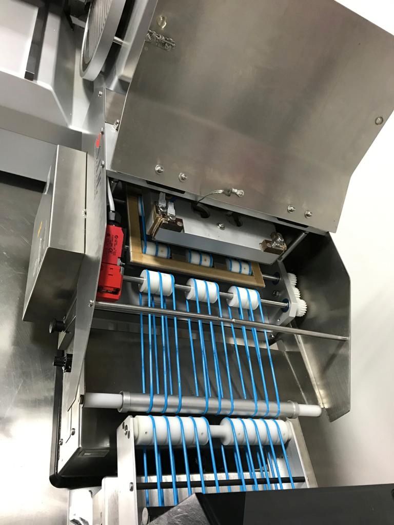 Slicer S.A.M Kuchler mit Verpackungslinie