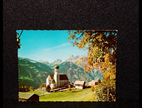 Ansichtskarte-Bartolomäberg gegen Zimba im Montafon.