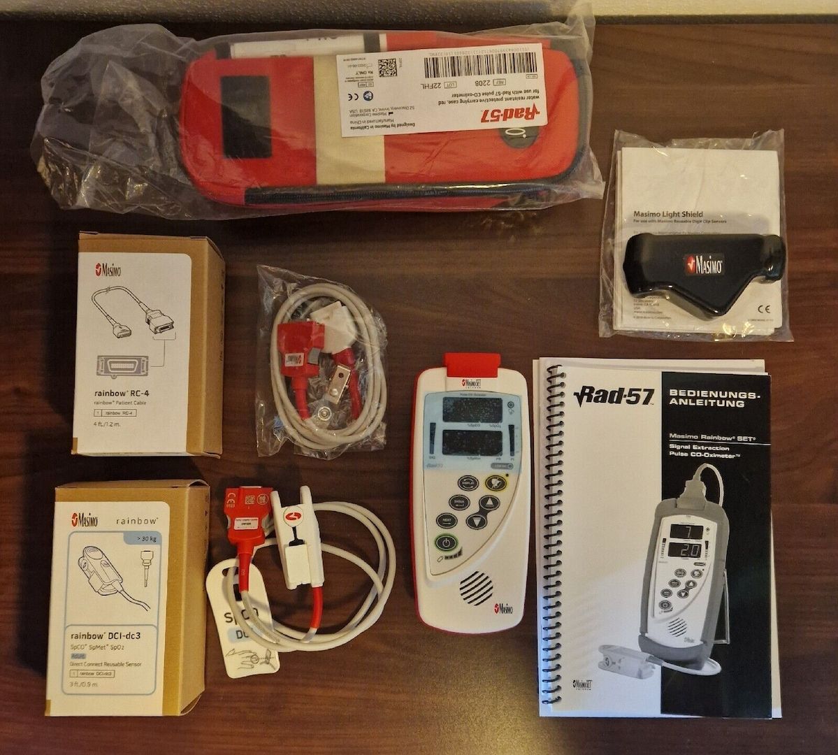 Masimo Rad-57 (SPO2, SPCO und SpMet) + Sensor, Kabeln, Hand-Cove