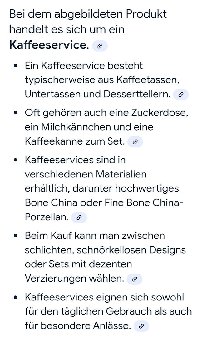 Das Bild zeigt ein Set aus sechs weißen Kaffeetassen oder Teetassen