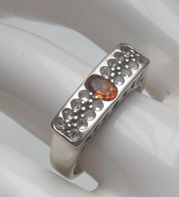 Ring, 925 Silber mit gefassten Weistopasen und einen Citrin