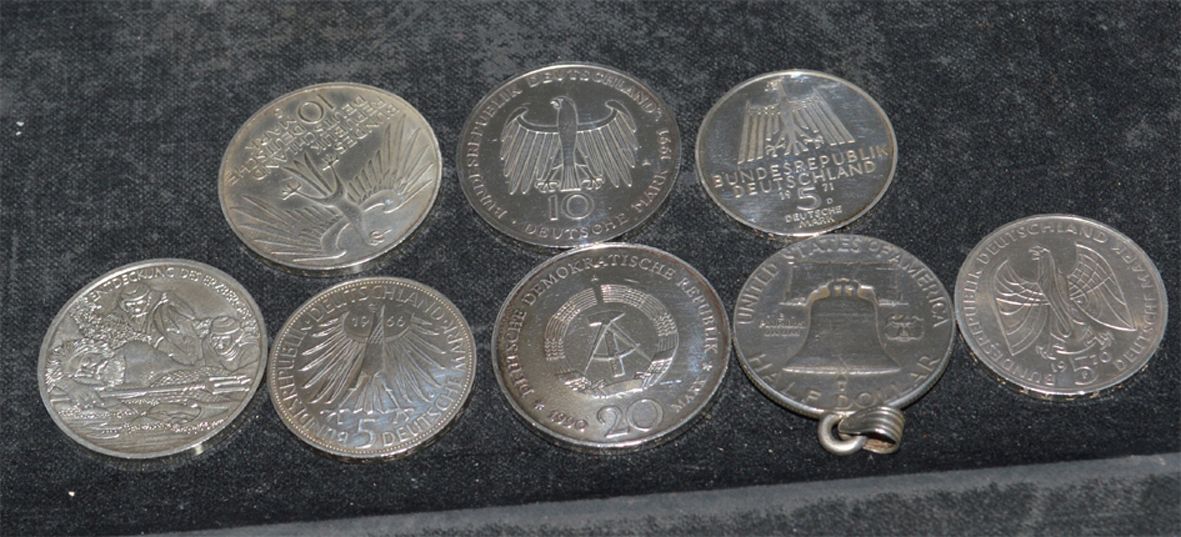 8 verschiedene Silbermünzen
