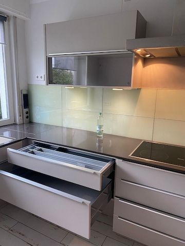 Einbauküche Nobilia-Miele Geräte-Steinplatte-Top Beleuchtung