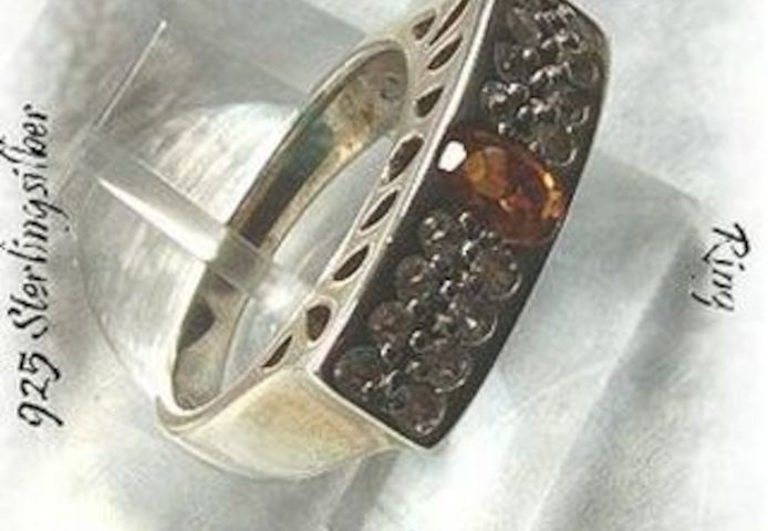 Ring, 925 Silber mit gefassten Weistopasen und einen Citrin